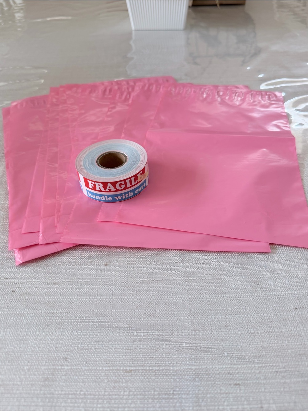 15 pink polys 6in x 9in and 300 (3in x 1in) fragile stickers bundle